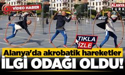 Alanya'da çember ile akrobatik hareketler yapan kişi ilgi odağı oldu