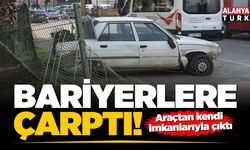 Yoldan çıkan otomobil bariyerlere çarptı