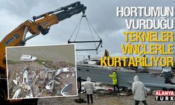 Hortumun vurduğu tekneler vinçlerle kurtarılıyor
