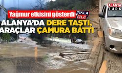 Alanya'da dere taştı, araçlar çamura battı