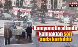 Kamyonetin altında kalmaktan son anda kurtuldu