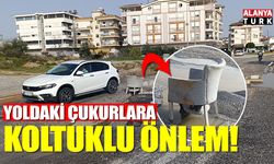 Yağışların sebep olduğu yoldaki çukura koltuklu önlem
