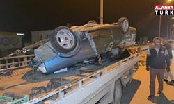 Takla atan otomobilden burunları bile kanamadan çıktılar