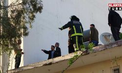 Çatıya çıkıp üzerine benzin döktü, gazeteci oyaladı polis yakaladı