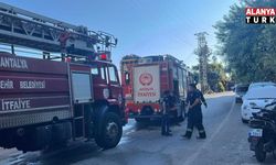 Alanya’da 3 katlı binanın zemin katında çıkan yangın korkuttu
