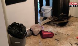 Tartıştığı eski kız arkadaşının daire kapısını benzinle ateşe verdi