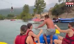 Kanyonda ziplinede asılı kalan turist çocuğu rafting rehberi kurtardı