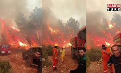 Antalya'da ekipler alevlerin arasında kalmaktan son anda kurtuldu