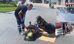 'DUR' levhasına uymayan otomobile çarpmamak için fren yaptı sürüklenen motosikletteki baba-oğul yaralandı