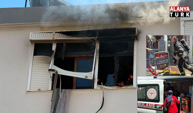 Antalya'da yangında ev sahibi ve bir itfaiye eri dumandan etkilendi